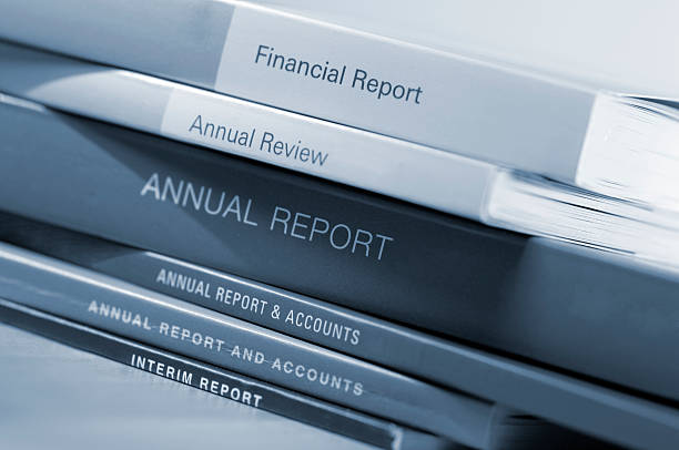 stack of financial and annual reports