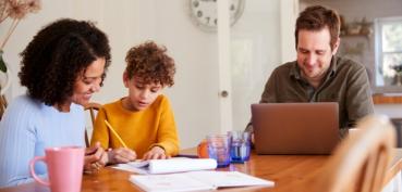 family working at table